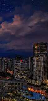 City skyline at night with stars above.