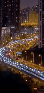 Night traffic flows under city skyscrapers in a vibrant urban scene.