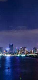 A vibrant night cityscape with glowing skyscrapers, reflecting in a waterfront.