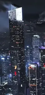 Skyscraper cityscape at night with lights.