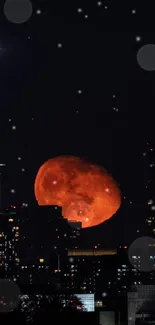 Red moon rising over city skyline at night.