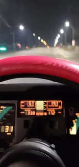 View from car dashboard on a night drive with brightly lit gauges.