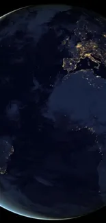 A mesmerizing view of Earth from space at night, highlighting city lights.