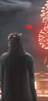 Person watching fireworks over city skyline.