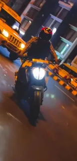 Motorcyclist riding at night in a vibrant cityscape.