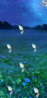 Butterflies hovering over a moonlit field under a starry blue sky.