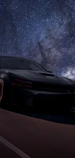 Sleek car driving under a starry night sky landscape.