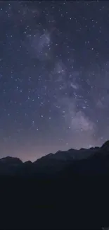 Beautiful starry night over mountains wallpaper.