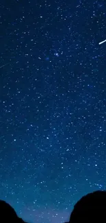 Starry night sky with shooting stars and deep blue hues on mobile wallpaper.