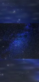 Starry night sky wallpaper with a deep blue cosmic background.