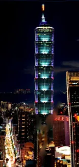 Taipei 101 illuminated at night with a vibrant cityscape.