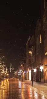 Nighttime city street with twinkling lights and dark buildings.