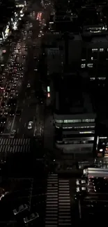 Nighttime urban street view with city lights.