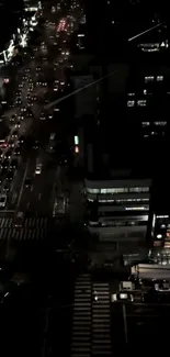 Beautiful city street view at night with bright lights and dark buildings.