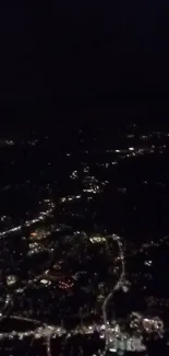 Aerial view of city lights at night.