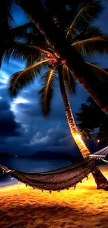 Tropical beach at night with hammock under palm trees, illuminated in warm light.