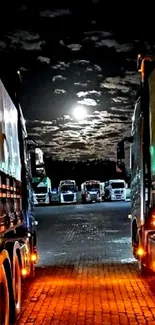 Night view of trucks parked under a full moon at a transport terminal.