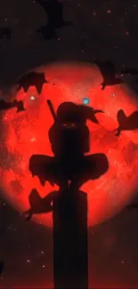 Silhouette of ninja against red moon with flying birds.