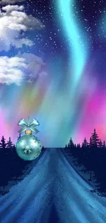 Northern Lights over a winter road with festive ornament.