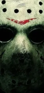 Creepy hockey mask with dark shadows wallpaper.