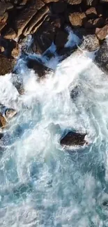 Aerial view of ocean waves crashing on rocks.