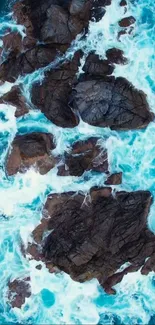 Aerial view of ocean waves crashing over rocks.