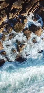 Aerial view of ocean waves breaking against coastal rocks.