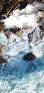 Aerial view of ocean waves crashing against rocks and cliffs.