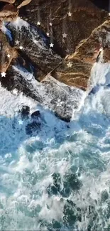 Aerial view of ocean waves crashing against rocks with star accents.