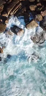 Aerial view of ocean waves crashing against rocks.