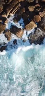 Aerial view of ocean waves crashing onto rocks.