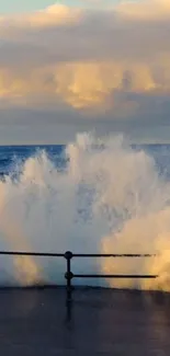 Mobile wallpaper of ocean waves crashing against a seawall at sunset.