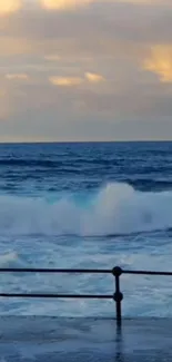 Ocean waves crashing against a sunset-lit horizon.