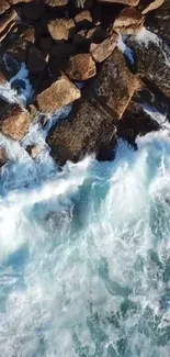 Aerial view of ocean waves crashing against rocks.