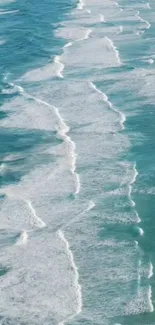 Aerial view of ocean waves and turquoise water, creating a serene mobile wallpaper.