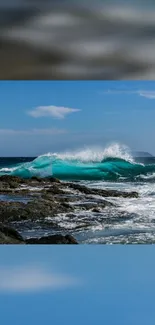 Dynamic ocean waves breaking against rocky shore under blue sky.