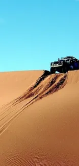 Off-road vehicle on sandy dunes wallpaper.