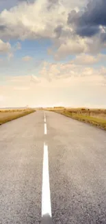 Scenic wallpaper featuring an endless open road under a bright sky.