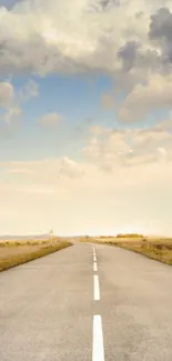 Open road under a vast serene sky, perfect for mobile wallpaper.