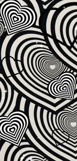 Black and white optical illusion heart wallpaper with geometric patterns.