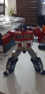 Optimus Prime action figure displayed on table.