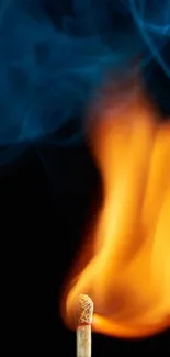 Matchstick with vibrant flame and smoke on a dark background.