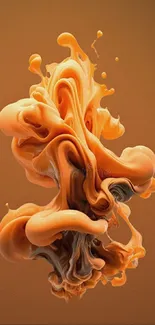 Orange ink splash in abstract form against dark background.