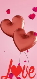 Red heart balloons on pink background