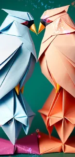 Artistic origami birds in pastel colors on a teal background.