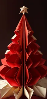 Festive origami Christmas tree in red and white hues with star top.