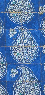 Ornate blue wallpaper pattern with intricate white designs.