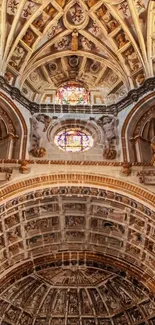 Ornate ceiling with stained glass window background.