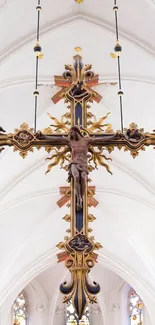 Ornate crucifix in gothic cathedral interior, spiritual and historic.