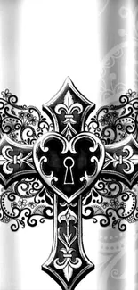 Grayscale ornate cross with floral designs on black and white background.